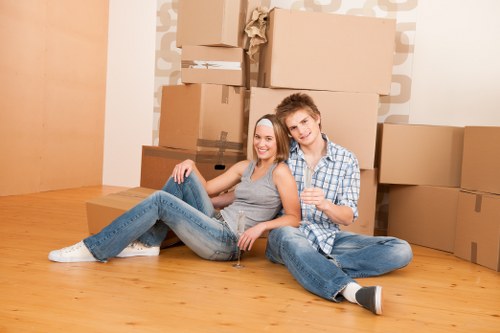 Removal van and moving boxes in a residential Ruislip street