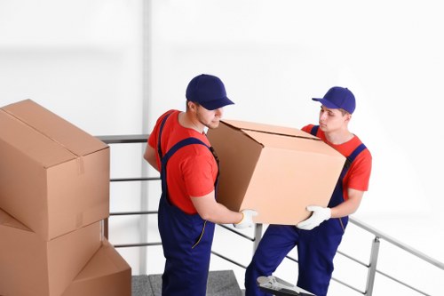 Furniture and boxes being loaded into a removal van for a Ruislip job