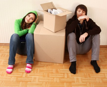 Business relocation checklist and packed supplies for a move