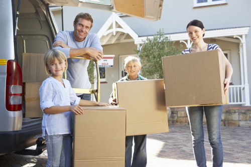 Professional movers preparing furniture for a house move in Ruislip