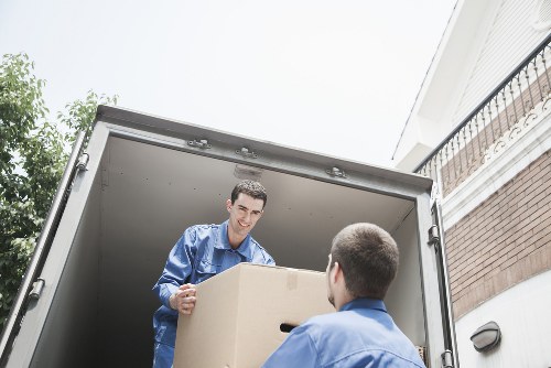 Removal vehicle loading office items for transport in Ruislip